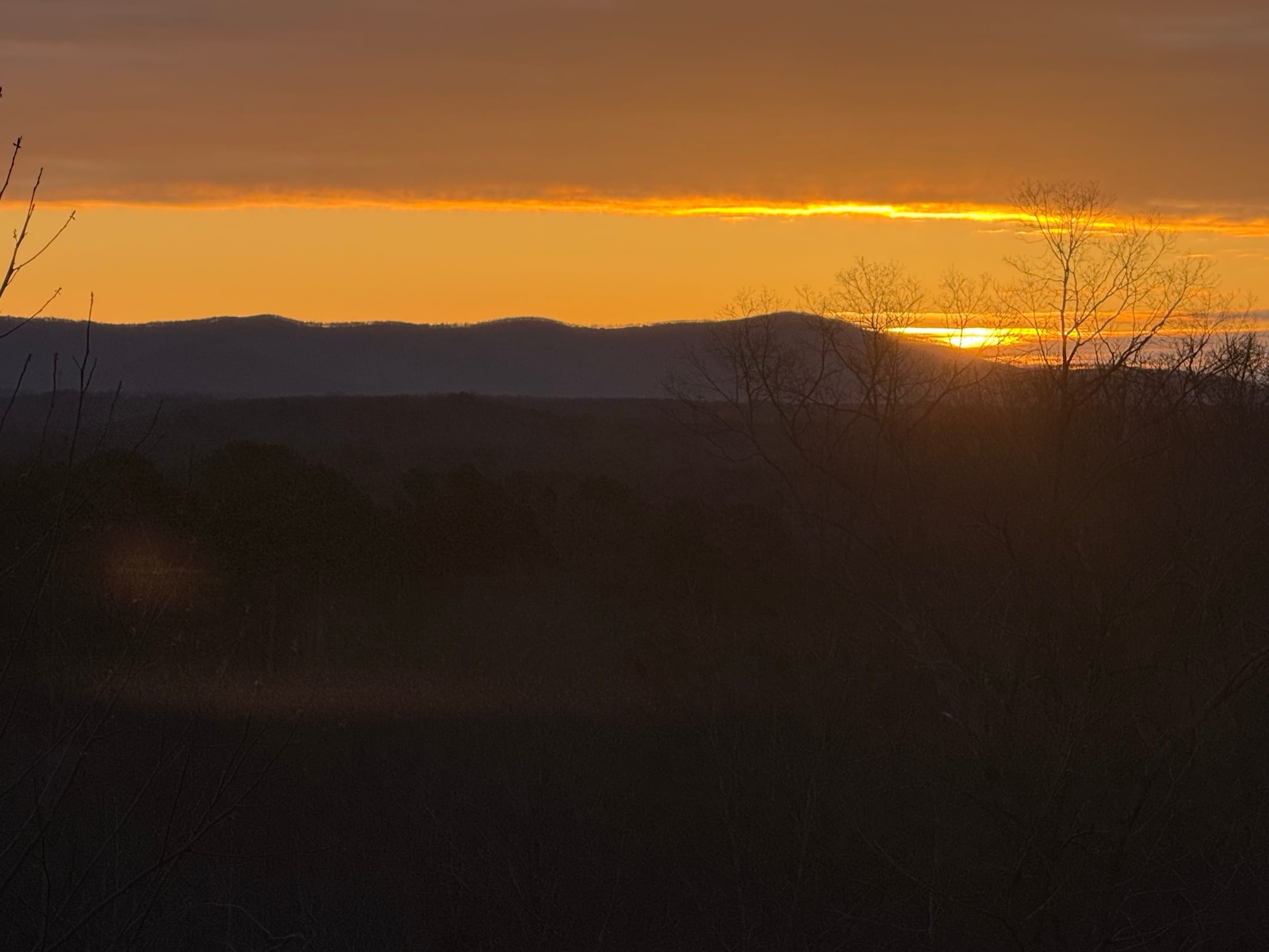 Golden-hour sunset over the North Georgia mountain ridges